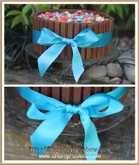 chocolate cake tied with satin ribbon bow